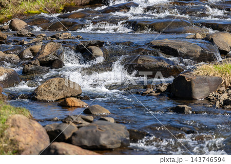Rocky stream and small cascades on the Studlagil approach in East Iceland 143746594
