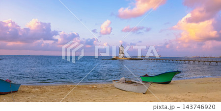Alexandria Egypt Lighthouse and Mediterranean Sea at Sunset, Peaceful Seascape with Historic Pier, Magical Clouds, Amazing Sky, Solitude, Calm 143746920