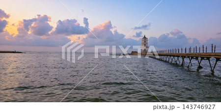 Alexandria Egypt Lighthouse and Mediterranean Sea at Sunset, Peaceful Seascape with Historic Pier, Magical Clouds, Amazing Sky, Solitude, Calm Alexandria Egypt Lighthouse and Mediterranean Sea at Sunset, Peaceful Seascape with Historic Pier, Magical Clouds, Amazing Sky, Solitude, Calm 143746927