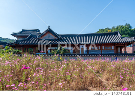 Traditional Korean Hanok Houses and Tiled Roofs against Bukhansan Mountain in Eunpyeong Hanok Village, Seoul Traditional Korean Hanok Houses and Tiled Roofs against Bukhansan Mountain in Eunpyeong Hanok Village, Seoul 143748191