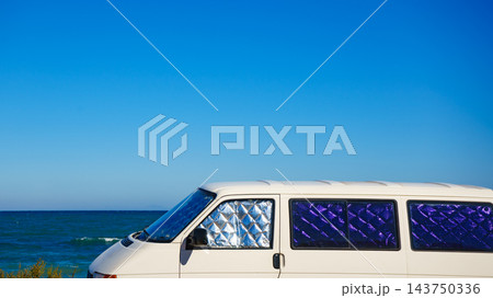 Camper van on beach, camping on nature Camper van on beach, camping on nature 143750336