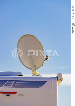 Satellite dish on roof of caravan Satellite dish on roof of caravan 143750348