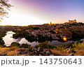 Toledo Skyline Reflected in the Tagus River at Twilight 143750643