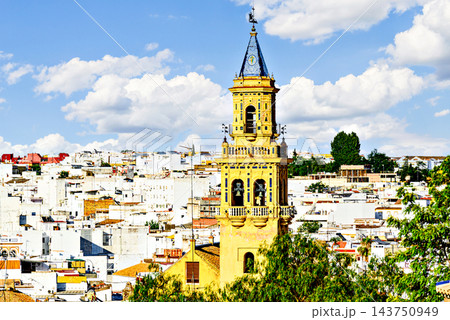 Bell tower of the Church of Santiago in Alcala de Guadaira, located in Plaza del Derribo; Seville. Bell tower of the Church of Santiago in Alcala de Guadaira, located in Plaza del Derribo; Seville. 143750949