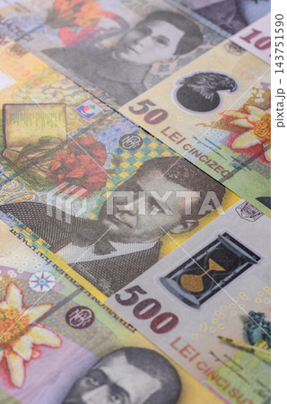 Romania, Romanian paper money, lei banknotes and bani coins as currency for exchange or travel Romania, Romanian paper money, lei banknotes and bani coins as currency for exchange or travel 143751590