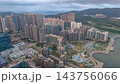 Hong Kong Oct 17 2022 Tseung Kwan O urban landscape and mountain backdrop 143756066