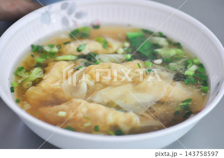 wonton, wonton soup or noodles or egg noodles or pork noodles 143758597