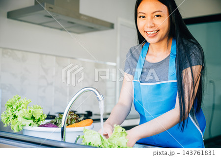 Bright clean vegetables being washed Bright clean vegetables being washed 143761831