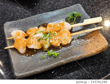 Grilled Scallop Skewers on a Plate Grilled Scallop Skewers on a Plate 143762290