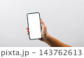 A hand holding a black cell phone isolated on white background, Man hand holding black smartphone mockup blank screen display 143762613