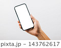 A hand holding a black cell phone isolated on white background, Man hand holding black smartphone mockup blank screen display 143762617