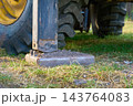 Hydraulic stops of bulldozer loader on construction site 143764083