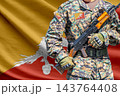 Bhutan flag with soldier holding assault rifle 143764408