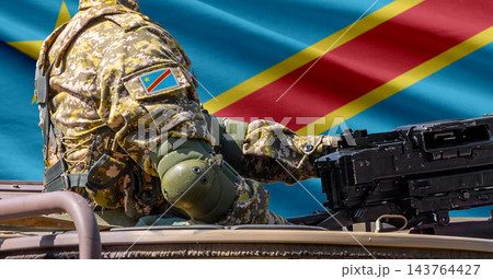 Democratic Republic of the Congo flag with soldier at machinegun turret Democratic Republic of the Congo flag with soldier at machinegun turret 143764427