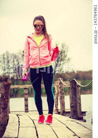 Young sports woman taking break after workout 143764961