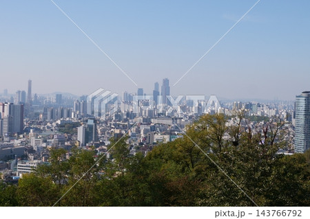 Famous N Seoul Tower landmark and urban skyline view from Namsan Mountain Famous N Seoul Tower landmark and urban skyline view from Namsan Mountain 143766792