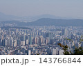 Famous N Seoul Tower landmark and urban skyline view from Namsan Mountain 143766844
