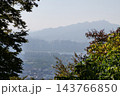 Famous N Seoul Tower landmark and urban skyline view from Namsan Mountain 143766850