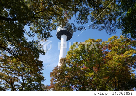 Famous N Seoul Tower landmark and urban skyline view from Namsan Mountain Famous N Seoul Tower landmark and urban skyline view from Namsan Mountain 143766852
