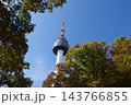 Famous N Seoul Tower landmark and urban skyline view from Namsan Mountain 143766855