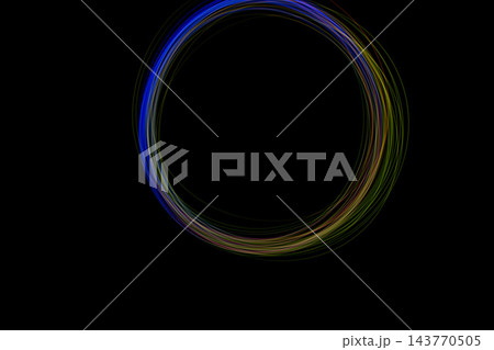 A vivid circle of freeze light appears against a dark background, displaying an array of vibrant colors in a smooth round design A vivid circle of freeze light appears against a dark background, displaying an array of vibrant colors in a smooth round design 143770505