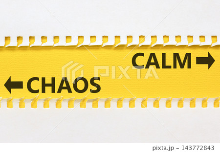 Calm instead chaos words symbol. Concept words Calm Chaos on beautiful yellow paper. Beautiful white background. Business medical psychology calm chaos concept. Copy space. Calm instead chaos words symbol. Concept words Calm Chaos on beautiful yellow paper. Beautiful white background. Business medical psychology calm chaos concept. Copy space. 143772843