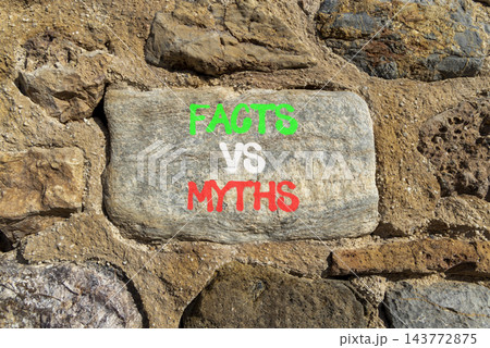 Facts vs versus myths words symbol. Concept words Facts vs Myths on beautiful grey stone. Beautiful stone wall background. Business and facts vs versus myths concept. Copy space. Facts vs versus myths words symbol. Concept words Facts vs Myths on beautiful grey stone. Beautiful stone wall background. Business and facts vs versus myths concept. Copy space. 143772875