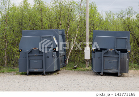 Waste sorting and recycling containers at remote collection point in Finnish Lapland 143773169