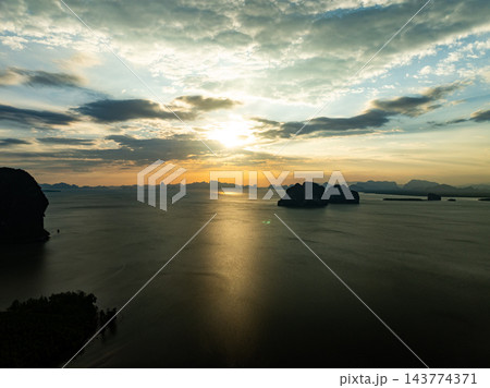 Aerial view sunset sky clouds,Beautiful Light Sunset or sunrise over sea nature background Aerial view sunset sky clouds,Beautiful Light Sunset or sunrise over sea nature background 143774371