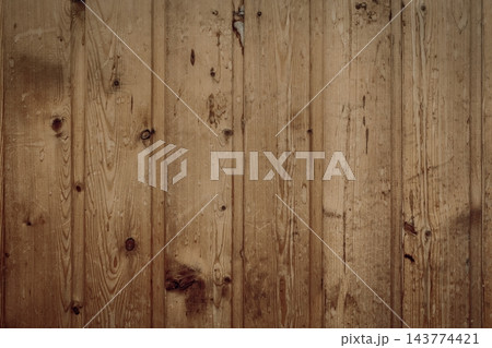 Weathered vintage wooden panel texture with knots and vertical planks. Natural grain patterns, scratches, water stains and aged imperfections. Weathered vintage wooden panel texture with knots and vertical planks. Natural grain patterns, scratches, water stains and aged imperfections. 143774421