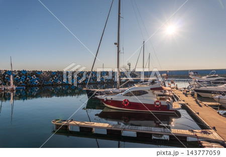 Boats at the dock in Imeretinsky Port, Sochi. Sirius. Krasnodar Krai, Russia. 143777059