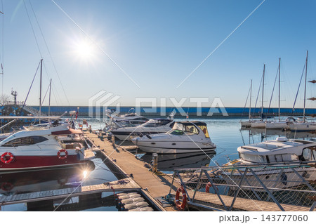 Boats at the dock in Imeretinsky Port, Sochi. Sirius. Krasnodar Krai, Russia. 143777060