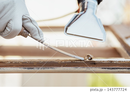 Carpenter at work, restoring an old wooden window. Carpentry. Carpenter at work, restoring an old wooden window. Carpentry. 143777724