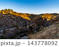 Winding Road Through Rocky Gorge at Sunset in Toledo 143778092