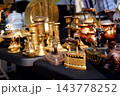 Old vintage things on the street flea market on square in front of the Cathedral of St. Mary Magdalene in Wroclav, Poland 143778252