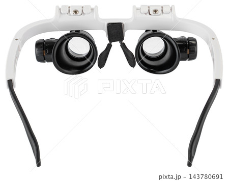 Adjustable magnifying glasses with dual lenses for detailed work 143780691