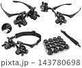 Black magnifying glasses with multiple lenses for detailed tasks 143780698