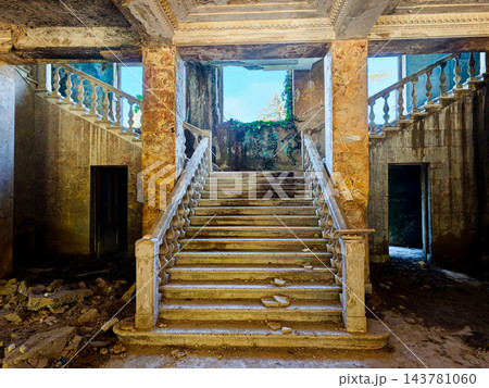 Crumbling staircase with yellow walls and columns in Sanatorium Imereti, Tskaltubo 143781060