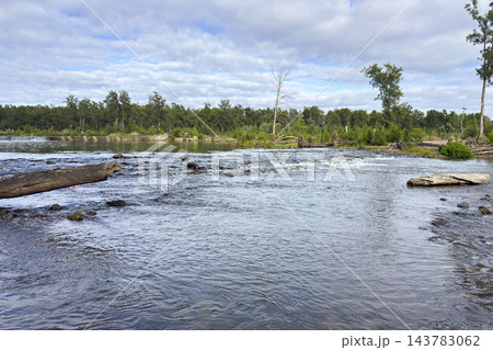 Fast flowing rapids in the Nepean River just passed the Penrith Weir 143783062