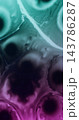 Vibrant splatter. Emulsion pour. Defocused blue purple neon color ink liquid substance round droplet spreading on abstract creative background. 143786287
