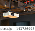 Ceiling Mounted Digital Video Projector in a Modern Office or Conference Room 143786998