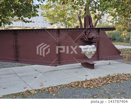 Warsaw, Poland - October 5, 2026: Damaged end of historic riveted steel bridge beam 143787404