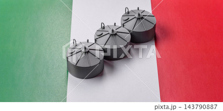 Liquefied gas storage tanks set against the Italian flag, as a background for your design 143790887