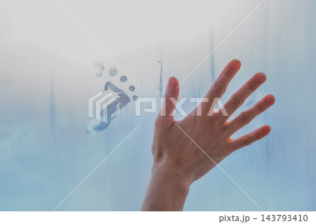 Waiting for Baby: Hand and Footprint on Misty Window Glass Waiting for Baby: Hand and Footprint on Misty Window Glass 143793410