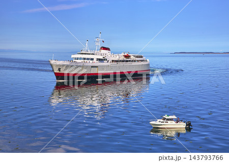 Ferry and Boat on Blue Water Pacific Coast Port Angeles Washington Ferry and Boat on Blue Water Pacific Coast Port Angeles Washington 143793766