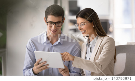 Positive business expert woman giving professional help to male coworker 143793971