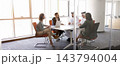 Multicultural team discussing strategy at conference table 143794004