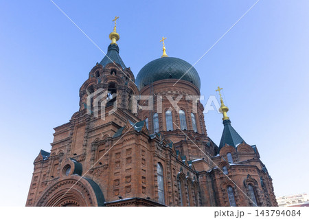 Harbin, Heilongjiang, China - Jan 3, 2026 : Many tourists visit the famous Saint Sophia Cathedral in Harbin, Heilongjiang, China on Jan 3, 2026. 143794084