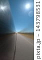 Vertical Long Exposure Car on Empty Sunlit Road 143798531