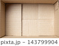 Open empty brown cardboard box background top view 143799904
